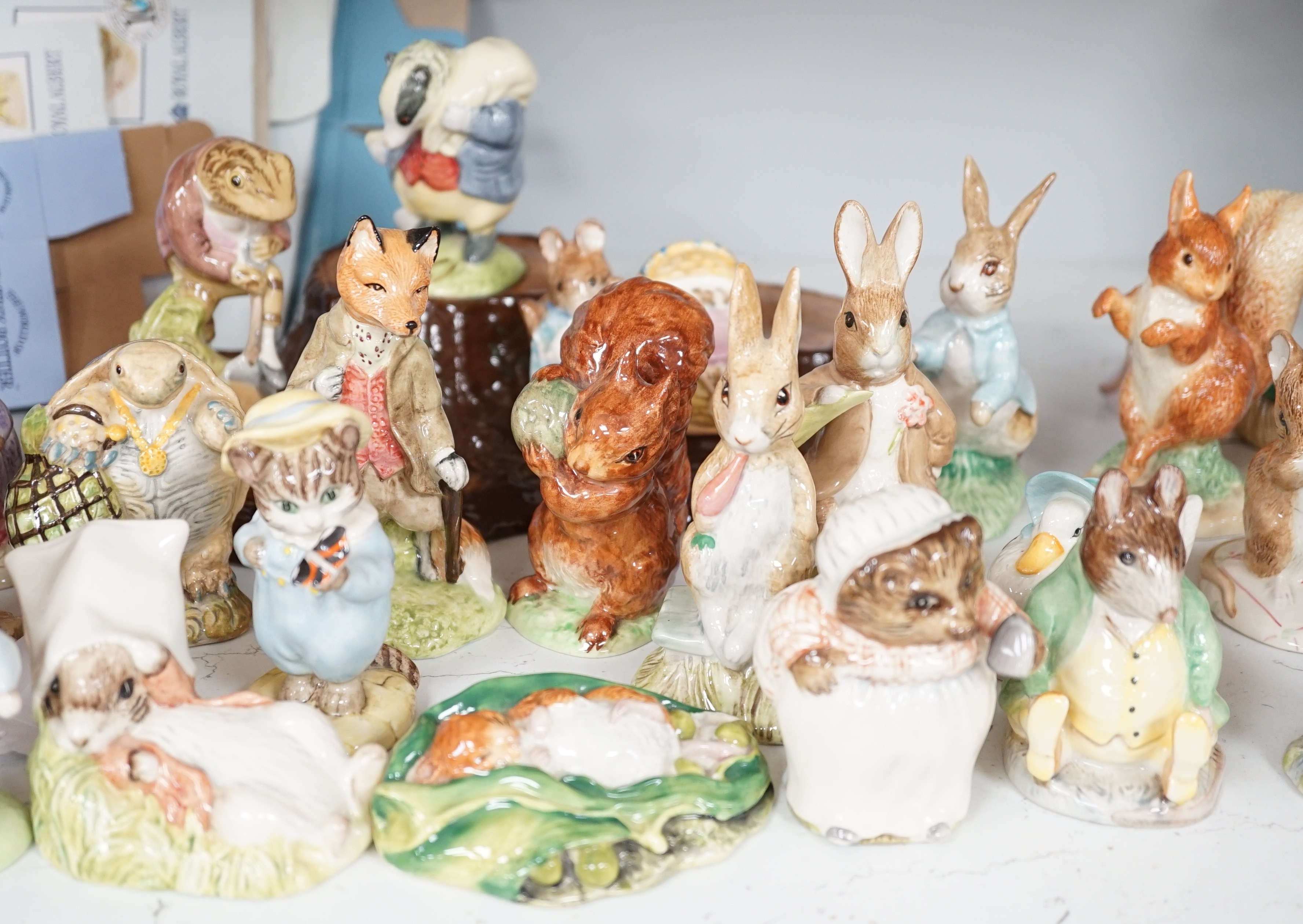 A collection Beswick, Royal Albert and Border Fine Arts Beatrix Potter figures